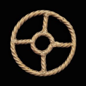 Late iron age gold, silver and copper alloy amulet