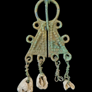 Viking period bronze omega fibula with shell pendants