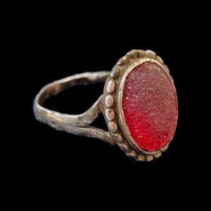 Late Renaissance silver ring with a red stone