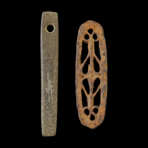 Viking period whetstone and ornamented iron fire striker