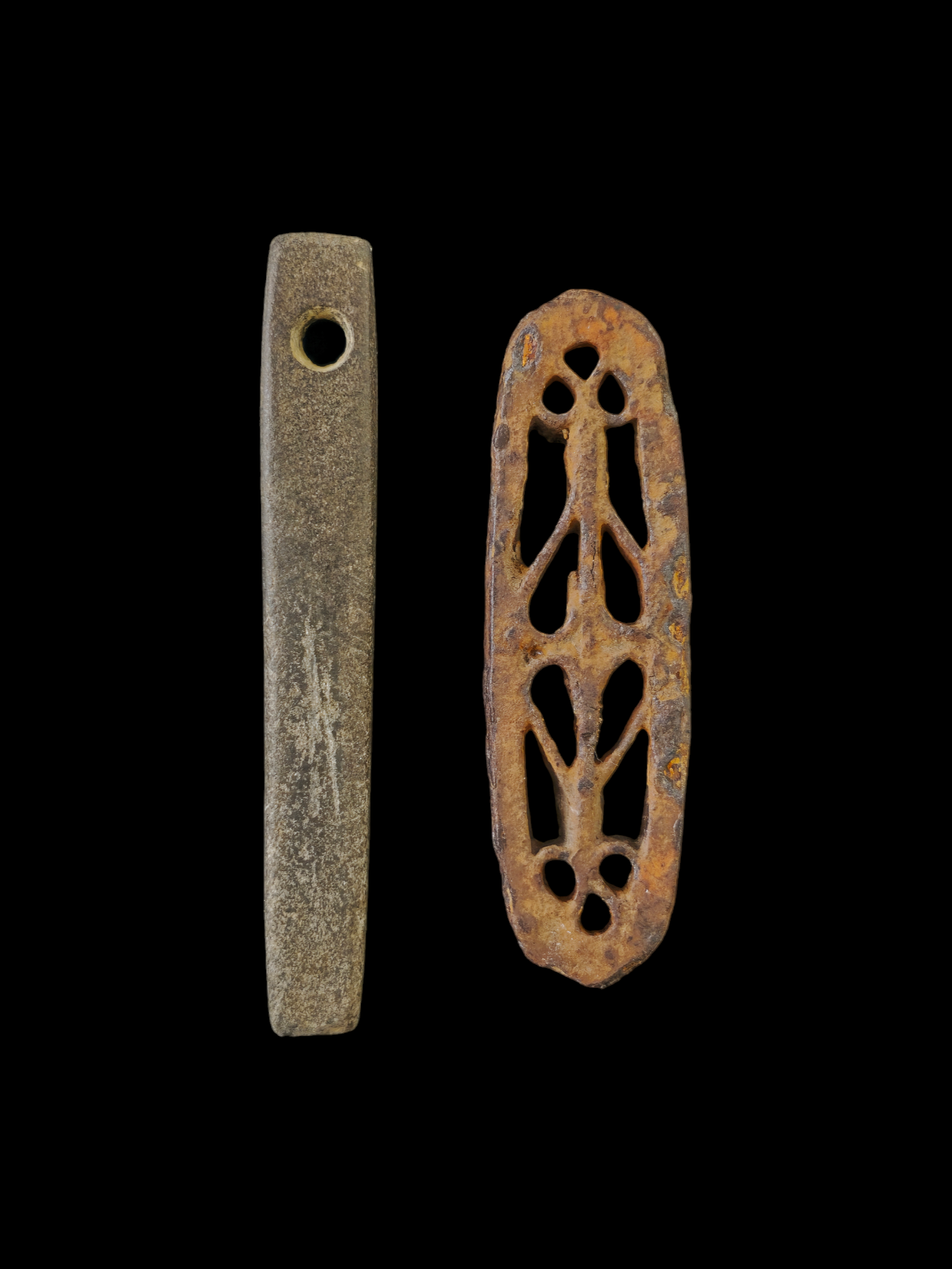 Viking period whetstone and ornamented iron fire striker