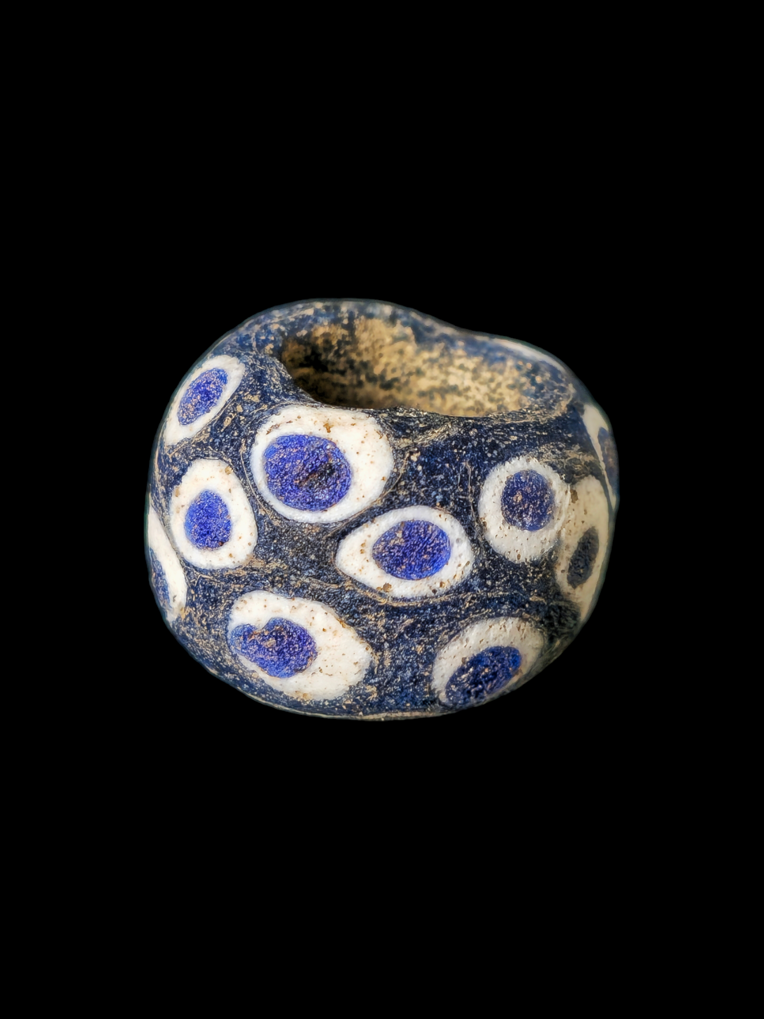 Mediterranean region stratified eye glass bead