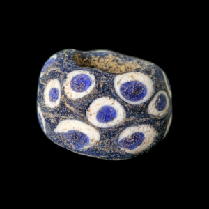 Mediterranean region stratified eye glass bead