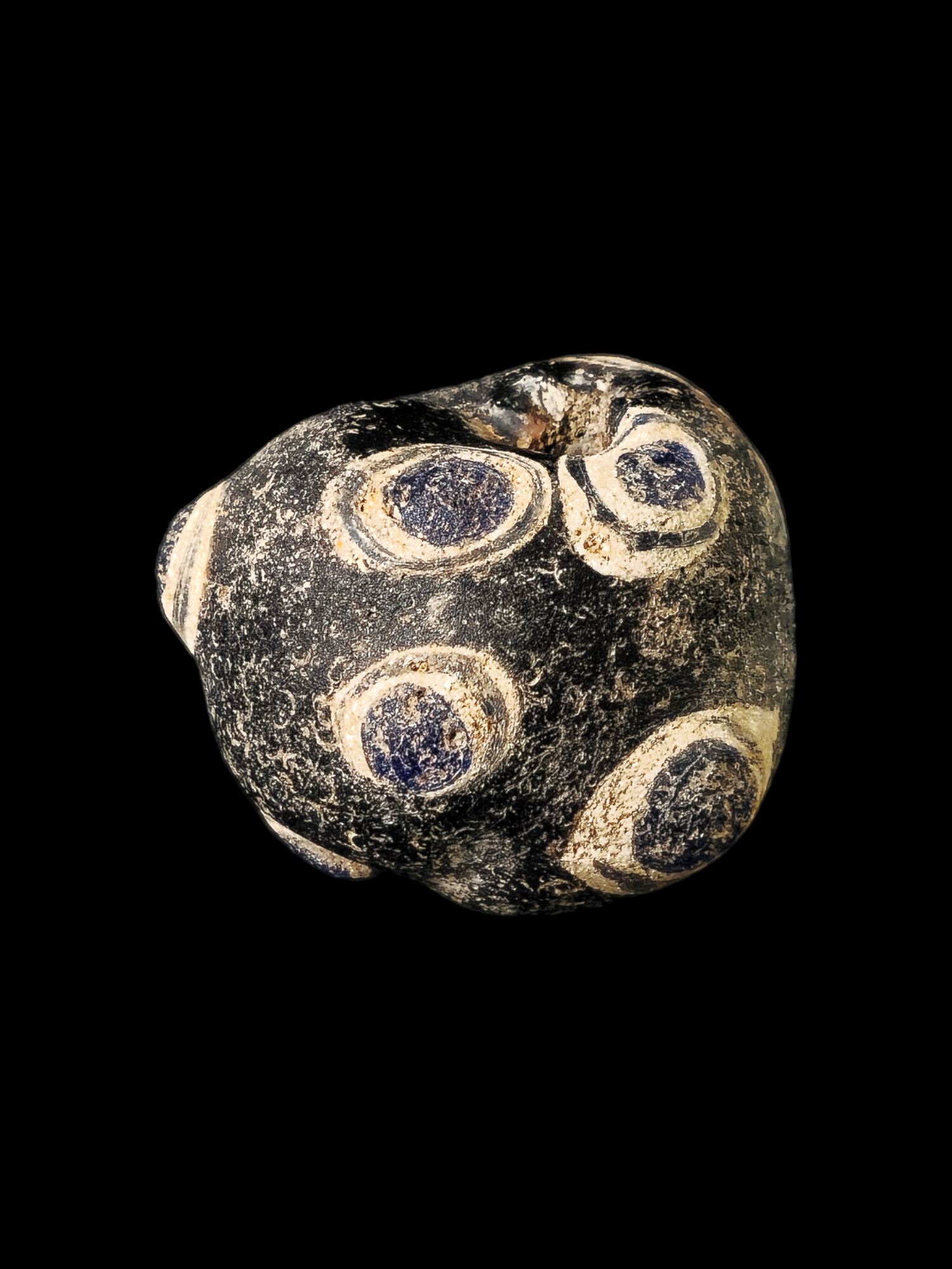 Mediterranean region stratified eye glass bead