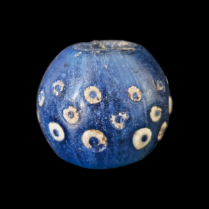 Mediterranean region stratified eye glass bead