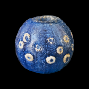 Mediterranean region stratified eye glass bead