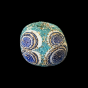 Mediterranean region stratified eye glass bead